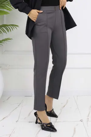 Carrot Trousers With Double Button Detail And Pockets
