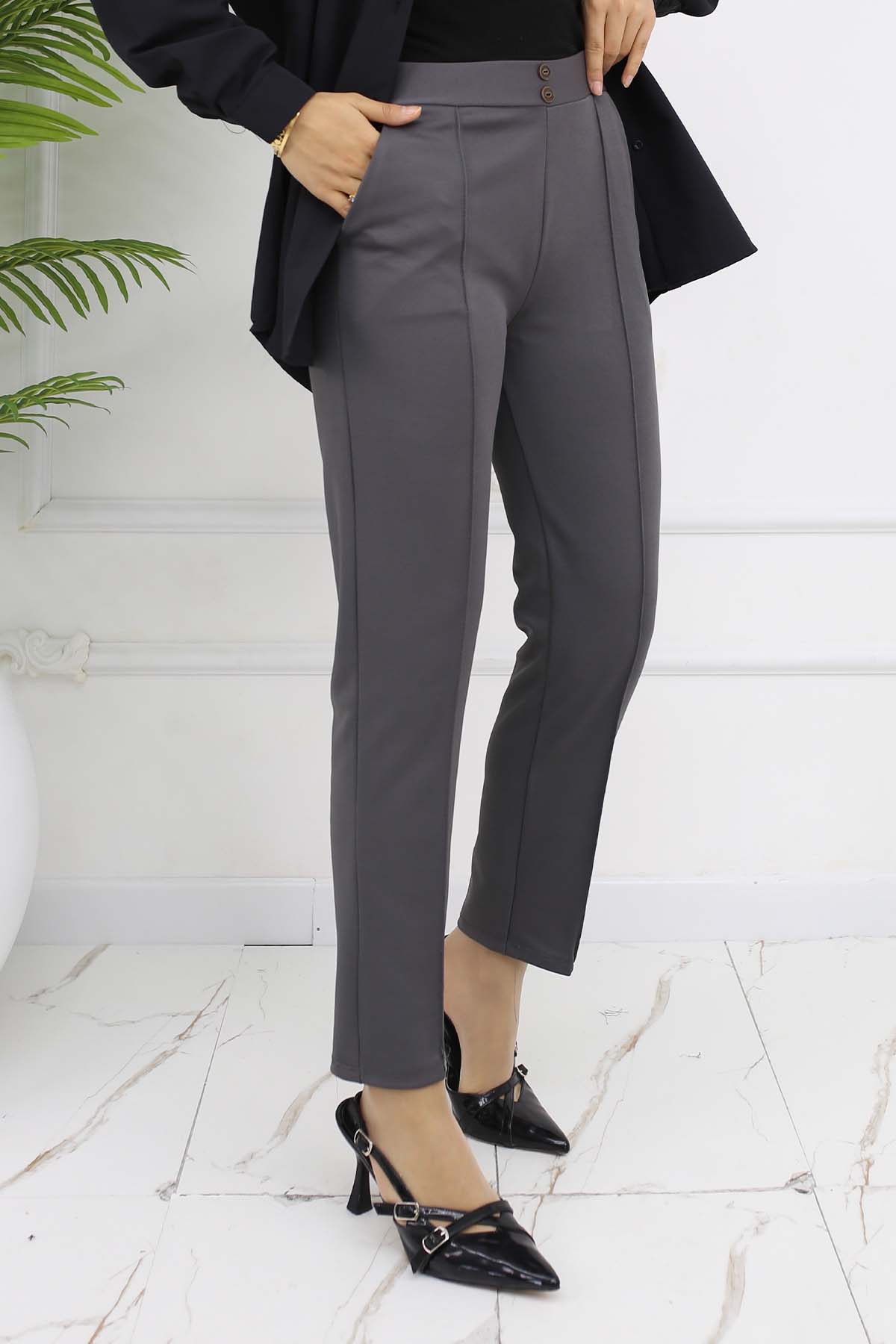 Carrot Trousers With Double Button Detail And Pockets