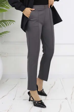 Carrot Trousers With Double Button Detail And Pockets